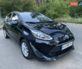 Чорний Тойота Aqua, об'ємом двигуна 1.5 л та пробігом 82 тис. км за 11500 $, фото 1 на Automoto.ua