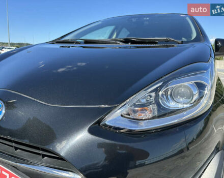 Чорний Тойота Aqua, об'ємом двигуна 1.5 л та пробігом 77 тис. км за 12500 $, фото 8 на Automoto.ua