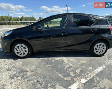 Чорний Тойота Aqua, об'ємом двигуна 1.5 л та пробігом 77 тис. км за 12500 $, фото 6 на Automoto.ua