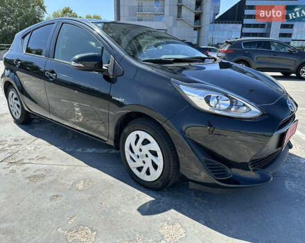 Чорний Тойота Aqua, об'ємом двигуна 1.5 л та пробігом 77 тис. км за 12500 $, фото 2 на Automoto.ua