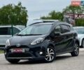 Черный Тойота Aqua, объемом двигателя 1.5 л и пробегом 127 тыс. км за 13300 $, фото 1 на Automoto.ua
