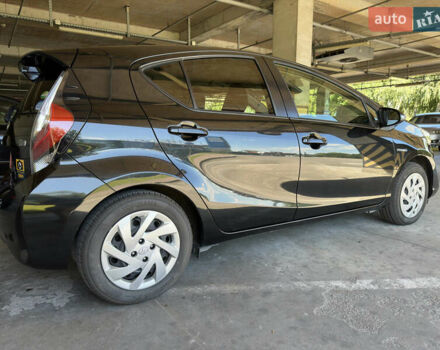 Чорний Тойота Aqua, об'ємом двигуна 1.5 л та пробігом 77 тис. км за 12500 $, фото 41 на Automoto.ua