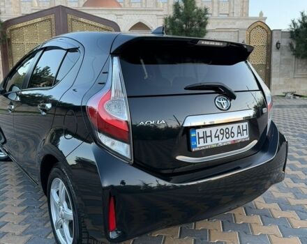Чорний Тойота Aqua, об'ємом двигуна 1.5 л та пробігом 67 тис. км за 13300 $, фото 6 на Automoto.ua
