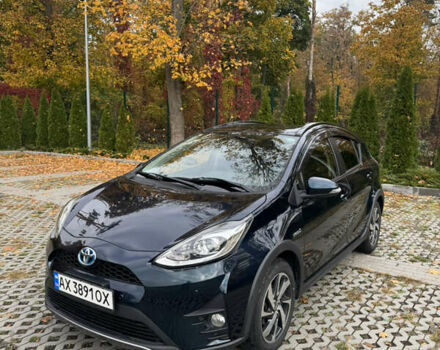 Черный Тойота Aqua, объемом двигателя 1.5 л и пробегом 63 тыс. км за 14200 $, фото 1 на Automoto.ua