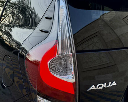 Черный Тойота Aqua, объемом двигателя 1.5 л и пробегом 64 тыс. км за 12900 $, фото 27 на Automoto.ua