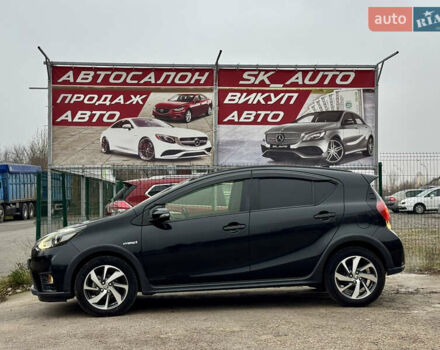 Чорний Тойота Aqua, об'ємом двигуна 1.5 л та пробігом 74 тис. км за 13999 $, фото 3 на Automoto.ua