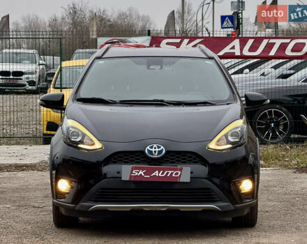 Чорний Тойота Aqua, об'ємом двигуна 1.5 л та пробігом 74 тис. км за 13999 $, фото 1 на Automoto.ua