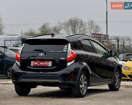 Чорний Тойота Aqua, об'ємом двигуна 1.5 л та пробігом 74 тис. км за 13999 $, фото 59 на Automoto.ua