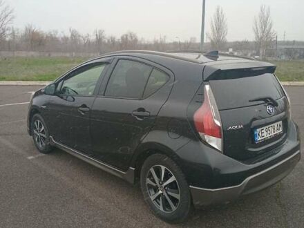 Черный Тойота Aqua, объемом двигателя 1.5 л и пробегом 75 тыс. км за 12500 $, фото 1 на Automoto.ua