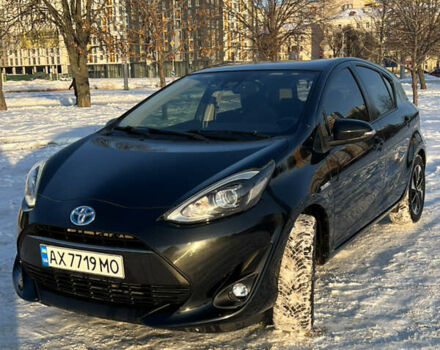 Черный Тойота Aqua, объемом двигателя 1.5 л и пробегом 104 тыс. км за 12500 $, фото 1 на Automoto.ua