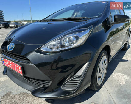 Чорний Тойота Aqua, об'ємом двигуна 1.5 л та пробігом 77 тис. км за 12500 $, фото 1 на Automoto.ua
