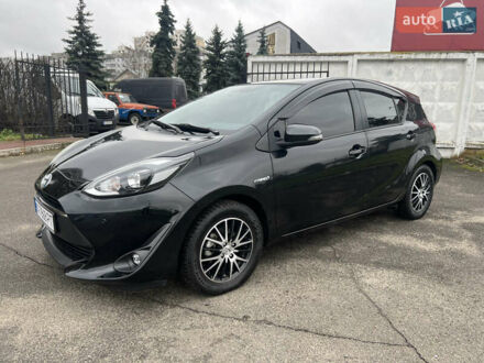 Черный Тойота Aqua, объемом двигателя 1.5 л и пробегом 135 тыс. км за 12300 $, фото 1 на Automoto.ua