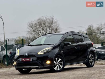 Чорний Тойота Aqua, об'ємом двигуна 1.5 л та пробігом 74 тис. км за 13999 $, фото 1 на Automoto.ua