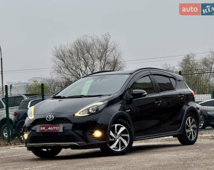 Чорний Тойота Aqua, об'ємом двигуна 1.5 л та пробігом 74 тис. км за 13999 $, фото 1 на Automoto.ua