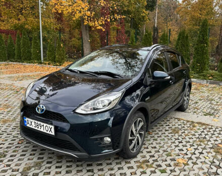 Чорний Тойота Aqua, об'ємом двигуна 1.5 л та пробігом 63 тис. км за 14200 $, фото 1 на Automoto.ua