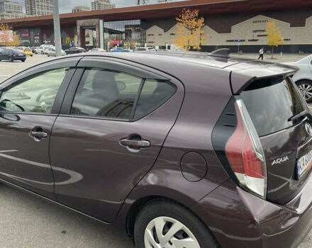 Фиолетовый Тойота Aqua, объемом двигателя 1.5 л и пробегом 83 тыс. км за 11900 $, фото 2 на Automoto.ua