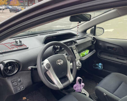 Фиолетовый Тойота Aqua, объемом двигателя 1.5 л и пробегом 83 тыс. км за 11900 $, фото 12 на Automoto.ua