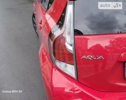 Красный Тойота Aqua, объемом двигателя 1.5 л и пробегом 65 тыс. км за 11999 $, фото 13 на Automoto.ua