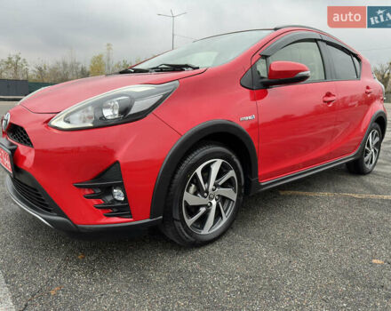 Красный Тойота Aqua, объемом двигателя 1.5 л и пробегом 79 тыс. км за 13700 $, фото 4 на Automoto.ua