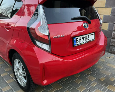 Червоний Тойота Aqua, об'ємом двигуна 1.5 л та пробігом 61 тис. км за 13300 $, фото 57 на Automoto.ua