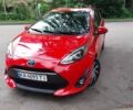 Червоний Тойота Aqua, об'ємом двигуна 1.5 л та пробігом 58 тис. км за 13100 $, фото 1 на Automoto.ua