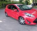 Красный Тойота Aqua, объемом двигателя 1.5 л и пробегом 64 тыс. км за 12600 $, фото 1 на Automoto.ua