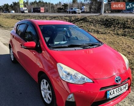 Красный Тойота Aqua, объемом двигателя 1.5 л и пробегом 125 тыс. км за 8799 $, фото 1 на Automoto.ua