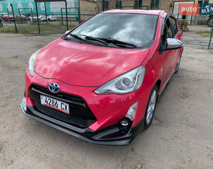 Красный Тойота Aqua, объемом двигателя 1.5 л и пробегом 54 тыс. км за 9300 $, фото 1 на Automoto.ua