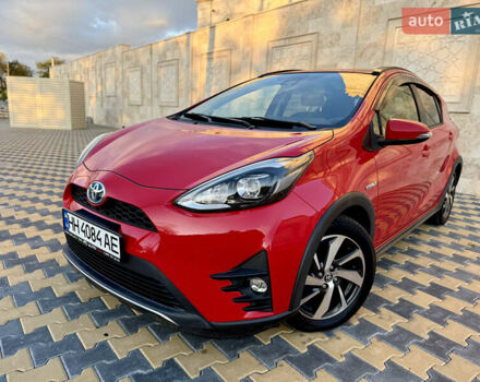 Красный Тойота Aqua, объемом двигателя 1.5 л и пробегом 80 тыс. км за 13600 $, фото 1 на Automoto.ua