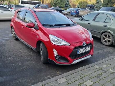 Красный Тойота Aqua, объемом двигателя 1.5 л и пробегом 82 тыс. км за 11500 $, фото 1 на Automoto.ua