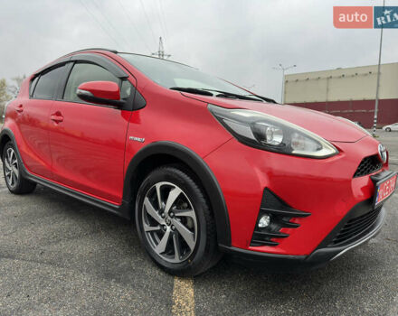 Красный Тойота Aqua, объемом двигателя 1.5 л и пробегом 79 тыс. км за 13700 $, фото 1 на Automoto.ua