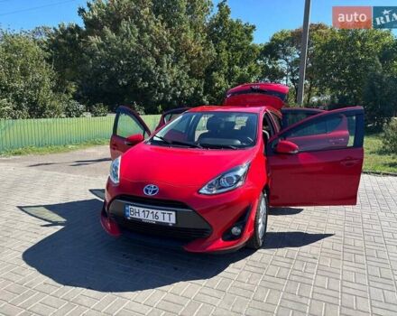 Красный Тойота Aqua, объемом двигателя 1.5 л и пробегом 94 тыс. км за 12500 $, фото 1 на Automoto.ua