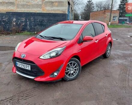 Красный Тойота Aqua, объемом двигателя 1.5 л и пробегом 56 тыс. км за 13300 $, фото 1 на Automoto.ua