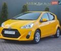 Желтый Тойота Aqua, объемом двигателя 1.5 л и пробегом 77 тыс. км за 10900 $, фото 1 на Automoto.ua