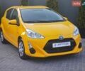 Желтый Тойота Aqua, объемом двигателя 1.5 л и пробегом 77 тыс. км за 10900 $, фото 1 на Automoto.ua