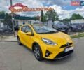 Желтый Тойота Aqua, объемом двигателя 1.5 л и пробегом 59 тыс. км за 13299 $, фото 1 на Automoto.ua