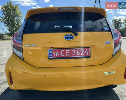 Желтый Тойота Aqua, объемом двигателя 1.5 л и пробегом 82 тыс. км за 13800 $, фото 2 на Automoto.ua