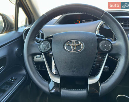 Желтый Тойота Aqua, объемом двигателя 1.5 л и пробегом 82 тыс. км за 13800 $, фото 32 на Automoto.ua