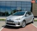 Серый Тойота Aqua, объемом двигателя 1.5 л и пробегом 166 тыс. км за 9000 $, фото 1 на Automoto.ua