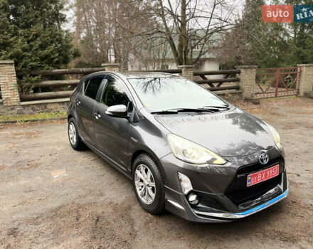 Серый Тойота Aqua, объемом двигателя 1.5 л и пробегом 61 тыс. км за 11400 $, фото 4 на Automoto.ua