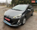 Серый Тойота Aqua, объемом двигателя 1.5 л и пробегом 61 тыс. км за 11400 $, фото 13 на Automoto.ua