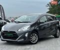 Серый Тойота Aqua, объемом двигателя 1.5 л и пробегом 94 тыс. км за 10990 $, фото 1 на Automoto.ua