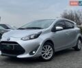 Сірий Тойота Aqua, об'ємом двигуна 1.5 л та пробігом 69 тис. км за 12490 $, фото 1 на Automoto.ua