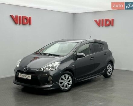 Серый Тойота Aqua, объемом двигателя 1.5 л и пробегом 157 тыс. км за 9408 $, фото 1 на Automoto.ua