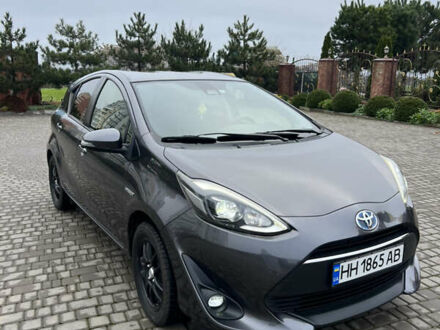 Серый Тойота Aqua, объемом двигателя 1.5 л и пробегом 162 тыс. км за 11650 $, фото 1 на Automoto.ua