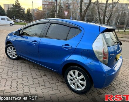 Синий Тойота Aqua, объемом двигателя 1.5 л и пробегом 125 тыс. км за 10350 $, фото 4 на Automoto.ua