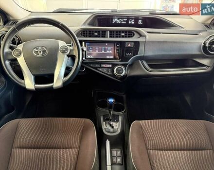 Синий Тойота Aqua, объемом двигателя 1.5 л и пробегом 84 тыс. км за 10790 $, фото 21 на Automoto.ua