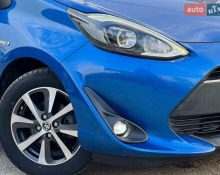 Синий Тойота Aqua, объемом двигателя 1.5 л и пробегом 76 тыс. км за 12800 $, фото 64 на Automoto.ua