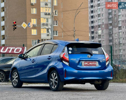 Синий Тойота Aqua, объемом двигателя 1.5 л и пробегом 76 тыс. км за 12800 $, фото 7 на Automoto.ua