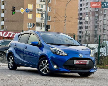 Синий Тойота Aqua, объемом двигателя 1.5 л и пробегом 76 тыс. км за 12800 $, фото 2 на Automoto.ua